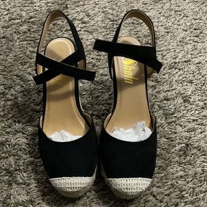Black wedges w/ wrap around strap.